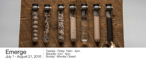 Alchemy Award winning sculpture showing ceramic process with mounted test tubes on aged wood panels